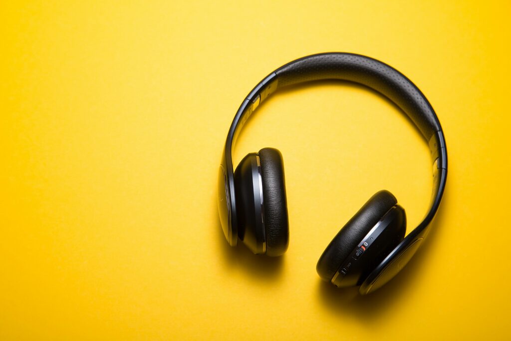 audio resources examples - flatlay photography of wireless headphones